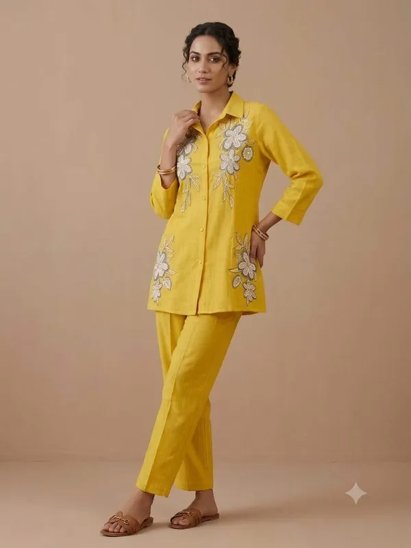 Embroidered_Cord_set_in_pure_with_beads_word_and_beauitful_designer_latkans_at_the_centre._pants_with_pocket_