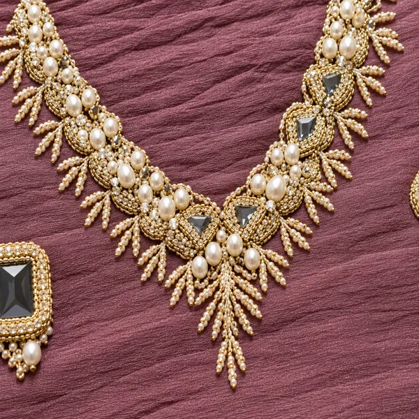 PURE_YOLK_PATTERN_EMBROIDERED_SUIT_WITH_PALAZOO_AND_DUPPATTA_