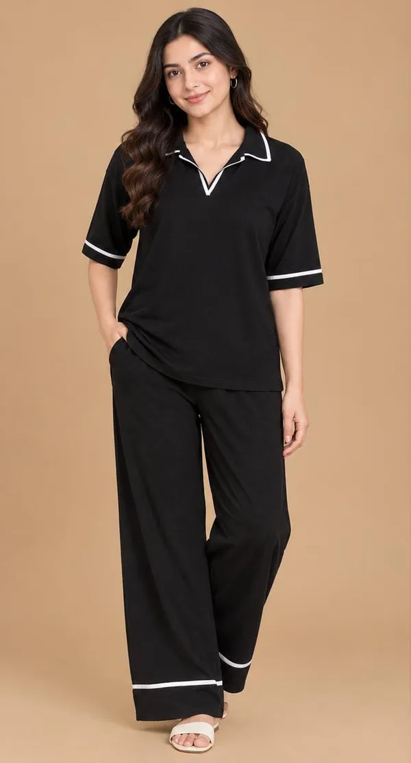 Stylish_black_two-piece_lounge_set_featuring_a_relaxed-fit_top_with_a_smart_collared_V-neckline_and_matching_wide-leg_trousers.
