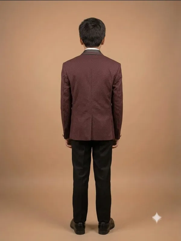 The_blazer_features_a_deep_maroon_base_fabric_decorated_with_a_subtle,_fine_white_micro-dot_or_pin-dot_pattern_throughout.__