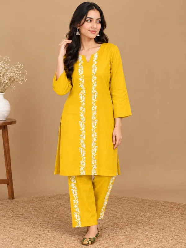 beautiful_mustard-yellow_ethnic_co-ord_set,_consisting_of_a_straight-cut_kurta_and_matching_trousers.