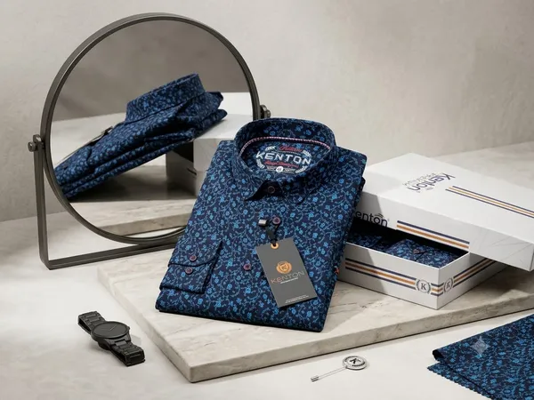 kentonDeep_navy_blue_featuring_a_light_blue_micro-floral_/_ornate_motif_print_across_the_entire_shirt.__