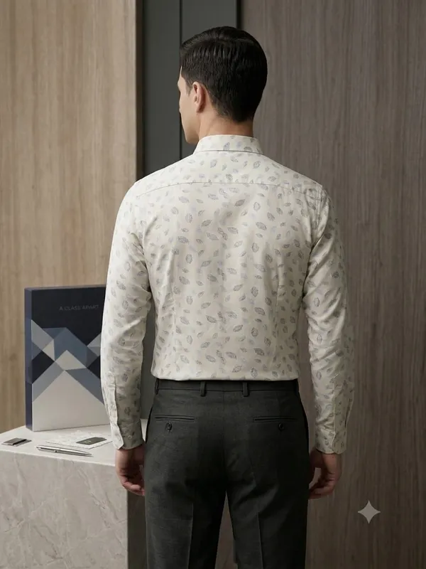kenton_all-over_leaf_motif_print_featuring_a_combination_of_light_blue_and_dark_grey/navy_leaves.__