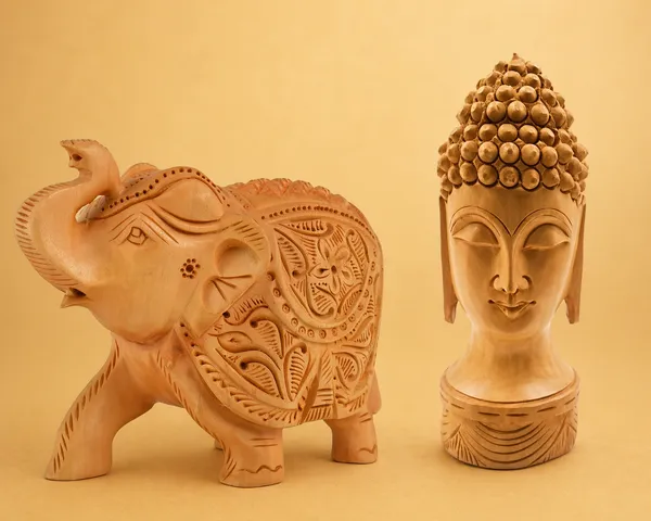 Handcrafted_Wooden_Elephant_Showpiece_With_Intricate_Carvings_And_Buddha_Head_Sculpture_With_Intricately_Carved_Hair_Pack_Of_2