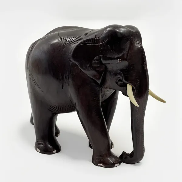 Handcrafted_Wooden_Elephant_Figurine_With_Ivory_Tusks