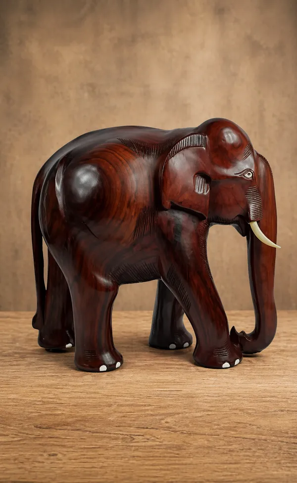Handcrafted_Wooden_Elephant_Sculpture_With_Ivory_Tusks_And_Dark_Brown_Finish