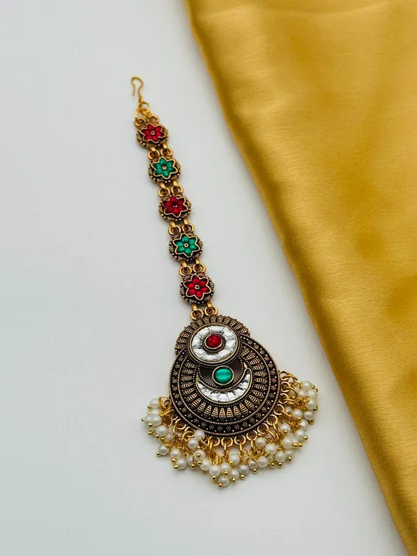 Antique_Gold_Plated_Maang_Tikka_With_Colorful_Gemstone_Accents_And_Pearl_Fringe