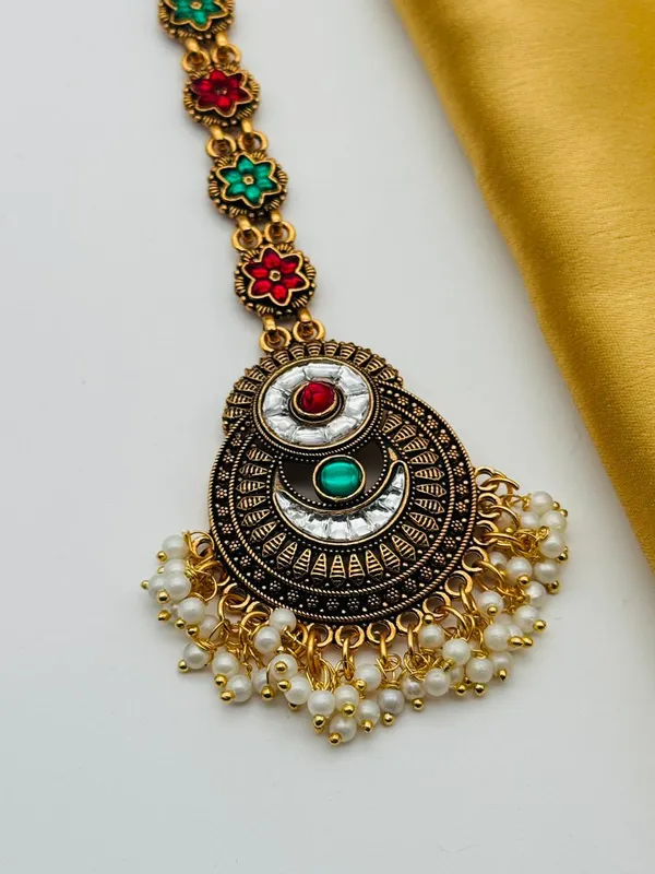 Antique_Gold_Plated_Maang_Tikka_With_Colorful_Gemstone_Accents_And_Pearl_Fringe