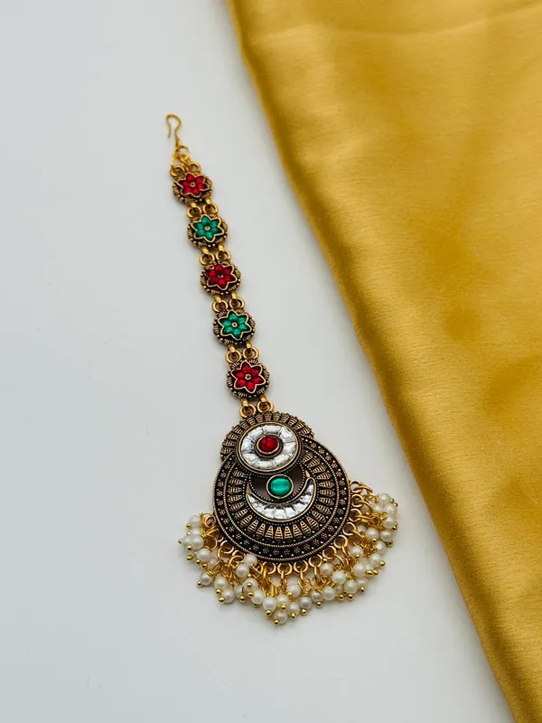 Antique_Gold_Plated_Maang_Tikka_With_Colorful_Gemstone_Accents_And_Pearl_Fringe