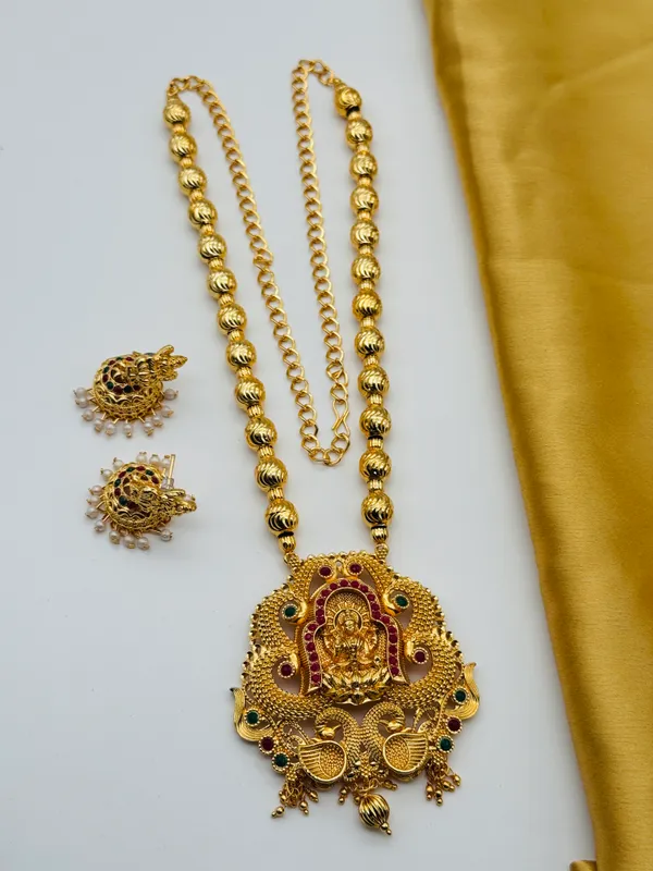 Mansi_Jewl_Point_Traditional_Temple_Design_Gold_Plated_Long_Haram_Necklace_Set_with_Jhumka_Earrings_for_Women_&_Girls,Women_Gold_Plated_Temple_Jewellery_Set_|_Long_Haram_Necklace_with_Lakshmi_Pendant_&_Matching_Jhumka_Earrings_|_Bridal_&_Festive_Wear