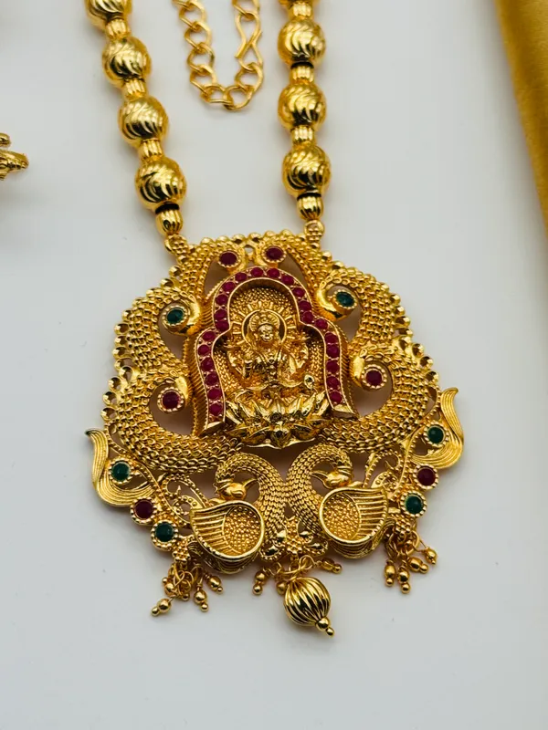 Mansi_Jewl_Point_Traditional_Temple_Design_Gold_Plated_Long_Haram_Necklace_Set_with_Jhumka_Earrings_for_Women_&_Girls,Women_Gold_Plated_Temple_Jewellery_Set_|_Long_Haram_Necklace_with_Lakshmi_Pendant_&_Matching_Jhumka_Earrings_|_Bridal_&_Festive_Wear