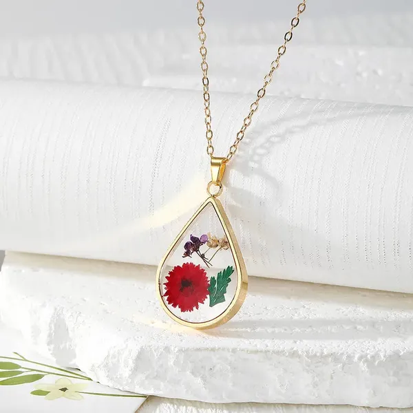 Resin_Pendant_-_Red_Flowers,_Green_Leaves,_Purple_and_Yellow_Starry_Sky