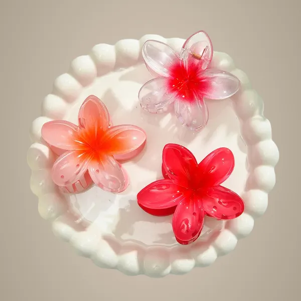 Colorful_plumeria_three_combinations_clip