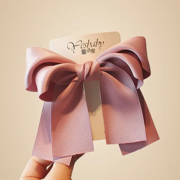 Korean_Ribbon_Bow_Hairpin_-_Bright_Peach