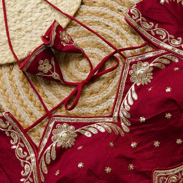 Maroon_Embroidered_Blouse_With_Backless_Design_And_Tassel_Ties