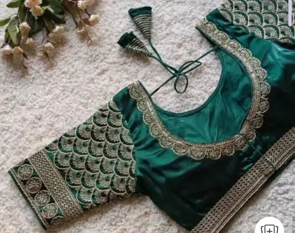 Green_Silk_Embroidered_Blouse_With_Golden_Zari_Work