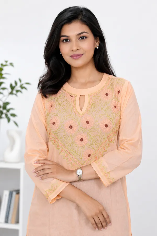 Mulmul_cotton_peach_kurta_with_contrast_chikan_embroidery