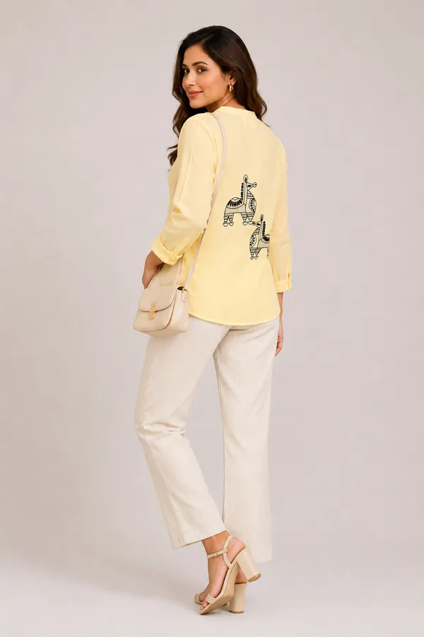Canary_yellow_chic_top_with_back_horse_motif_in_chikankari_and_kasab_jaali_detailing