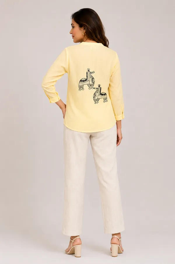 Canary_yellow_chic_top_with_back_horse_motif_in_chikankari_and_kasab_jaali_detailing