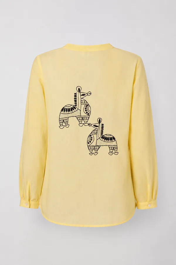 Canary_yellow_chic_top_with_back_horse_motif_in_chikankari_and_kasab_jaali_detailing