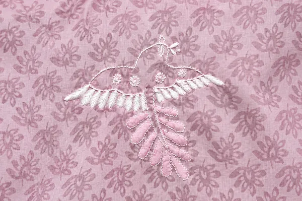 Chic_and_elegant_pink_Brasso_Cotton_Kurti_With__minimal__Chikankari_Bird_Motif