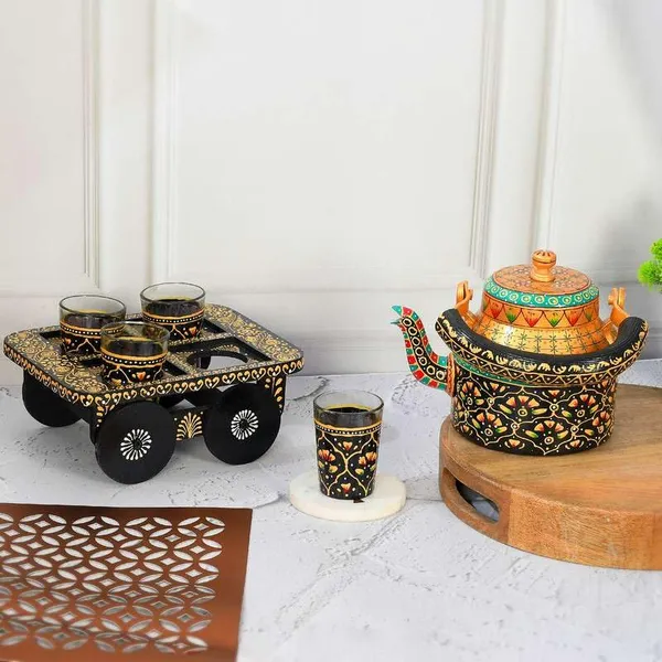 Aluminum_Tea_Kettle_With_Glasses_And_Wooden_Tray