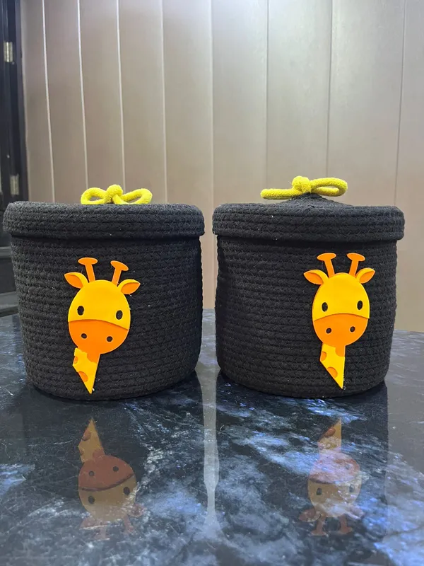 Pack_Of_2_Black_Knitted_Storage_Baskets_With_Yellow_Giraffe_Design_And_Bow_Lid