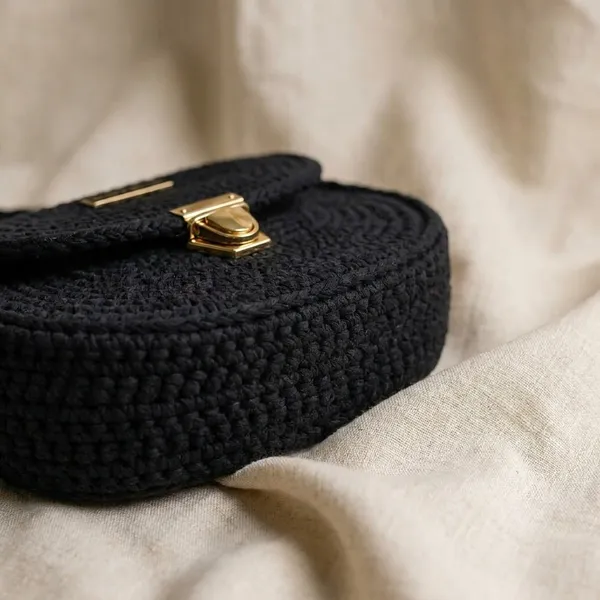 Black_Woven_Crossbody_Bag_With_Gold_Hardware