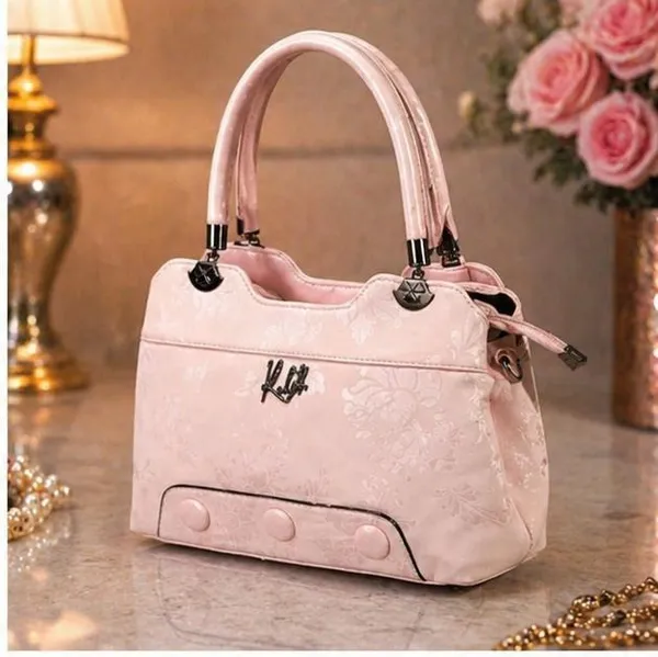 Elegant_Pink_Patent_Leather_Handbag_with_Embossed_Floral_Design