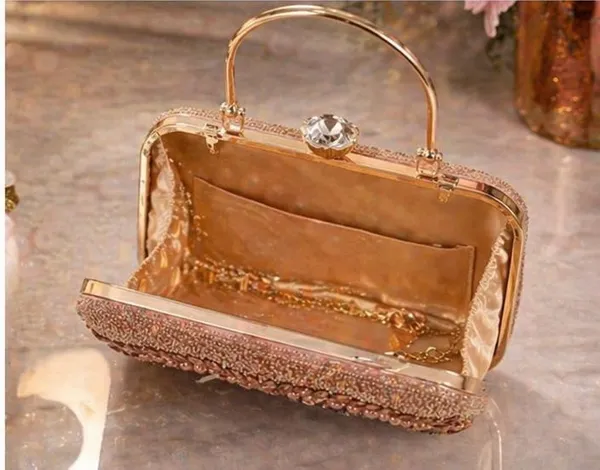 Elegant_Rose_Gold_Embellished_Clutch_with_Pearl_and_Crystal_Detailing