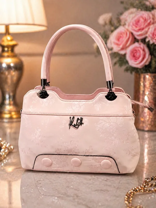 Elegant_Pink_Patent_Leather_Handbag_with_Embossed_Floral_Design
