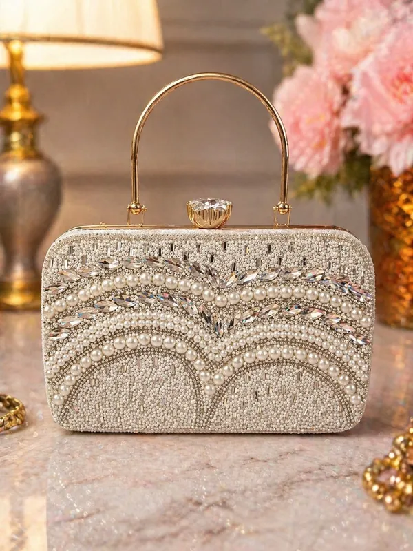 Handcrafted_Pearl_and_Crystal_Embellished_Evening_Clutch_with_Metal_Handle
