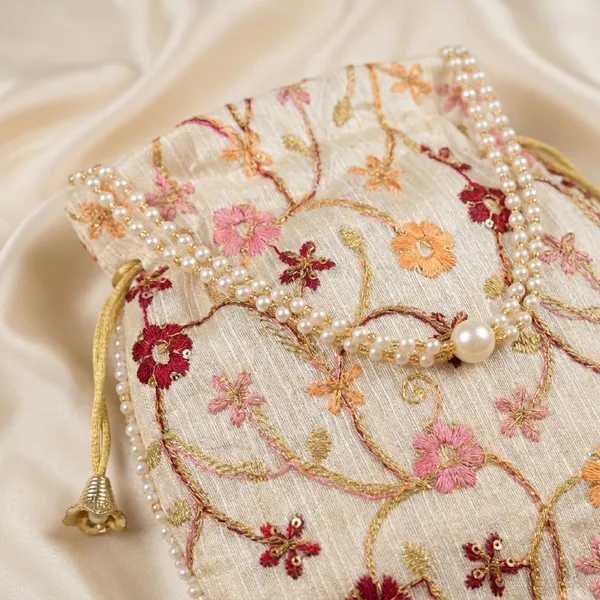 Elegant_Embroidered_Silk_Potli_Bag_With_Pearl_Handle_For_Women