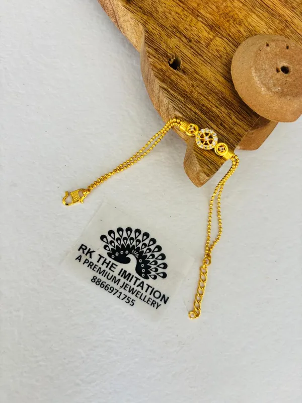 Goldplated_Chain_Bracelet_With_Dual_Charms