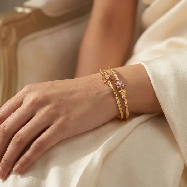Elegant_Gold_Toned_Stackable_Bangle_Set_With_Crystal_Accents