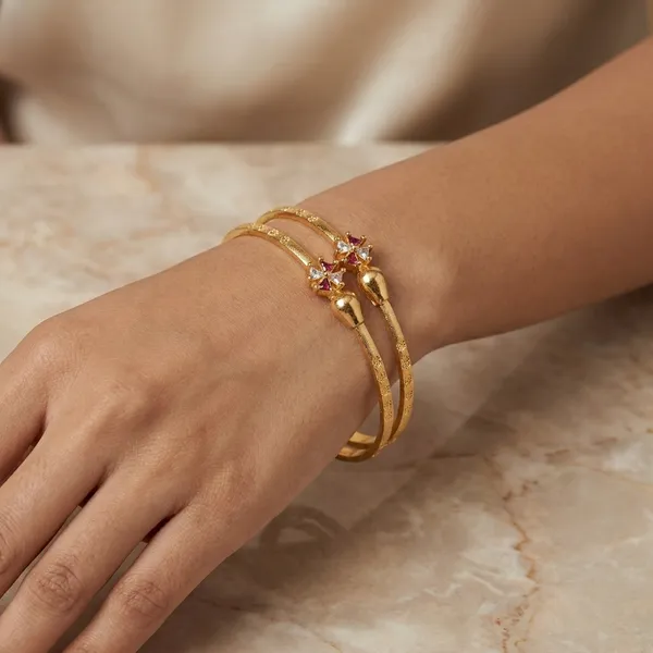 Goldplated_Textured_Bangles_With_Pink_Stone_Accent