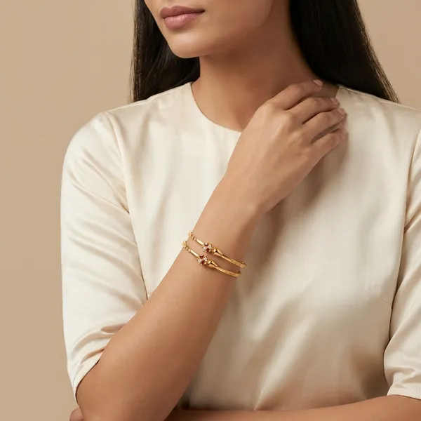 Goldplated_Textured_Bangles_With_Pink_Stone_Accent