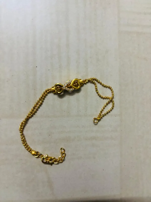 Goldtoned_Delicate_Chain_Bracelet_With_Heart_Clasp