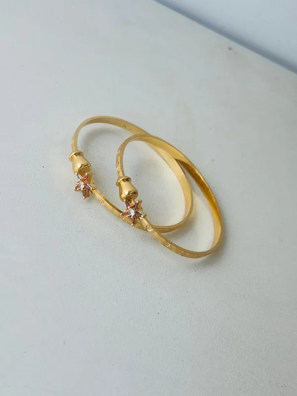 Elegant_Gold_Toned_Stackable_Bangle_Set_With_Crystal_Accents