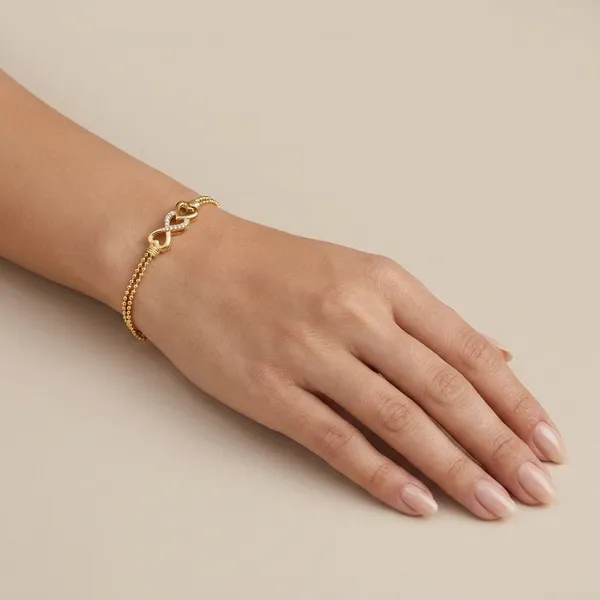 Goldtoned_Delicate_Chain_Bracelet_With_Heart_Clasp