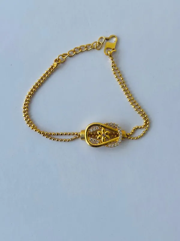 Golden_Flower_Charm_Bracelet_With_Crystal_Embellishments