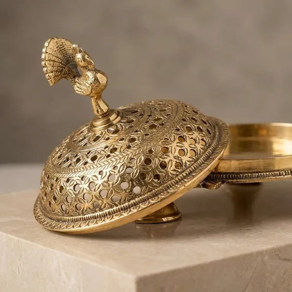 Polished_Brass_Artisanal_Serving_Dish_With_Regal_Peacock_Handle_And_Dome_Lid
