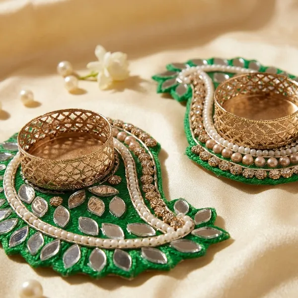 Artisanal_Lustrous_Gold_Diya_Pack_With_Emerald_Green_Regal_Peacock_Design_Pack_Of_2