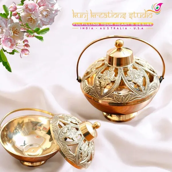 Premium_Polished_Brass_Artisanal_Diya_With_Intricate_Floral_Design_And_Handle_Pack_Of_2
