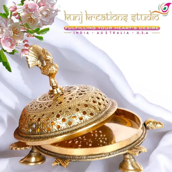 Polished_Brass_Artisanal_Serving_Dish_With_Regal_Peacock_Handle_And_Dome_Lid