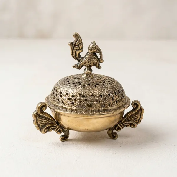 Artisanal_Polished_Brass_Incense_Burner_With_Regal_Peacock_Design