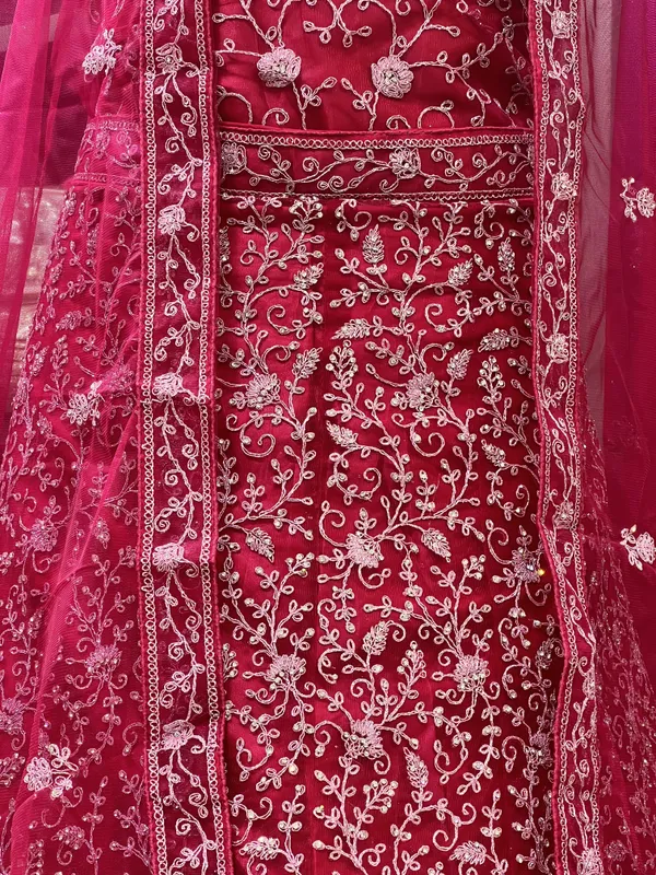Magenta_Pink_Net_Bridal_Lehenga_Choli_Set_With_Heavy_Embroidery