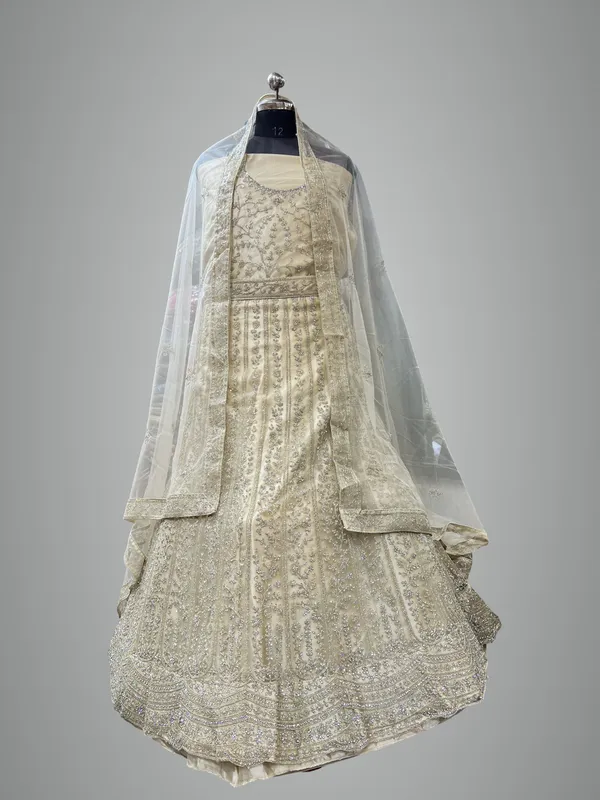 Off-White_Net_Bridal_Lehenga_Choli_Set_With_Silver_Embroidery
