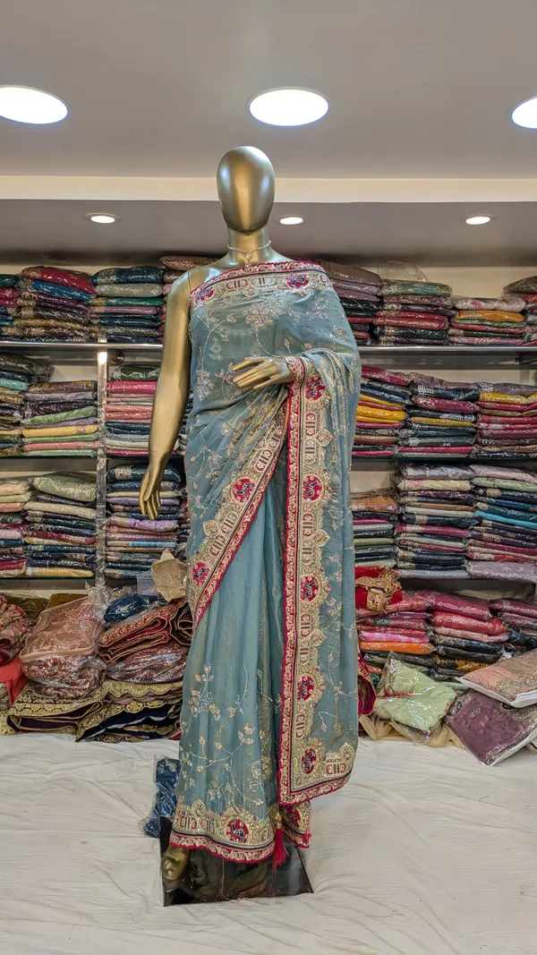 Blue_Fendi_Silk_Saree_With_Embellished_Border