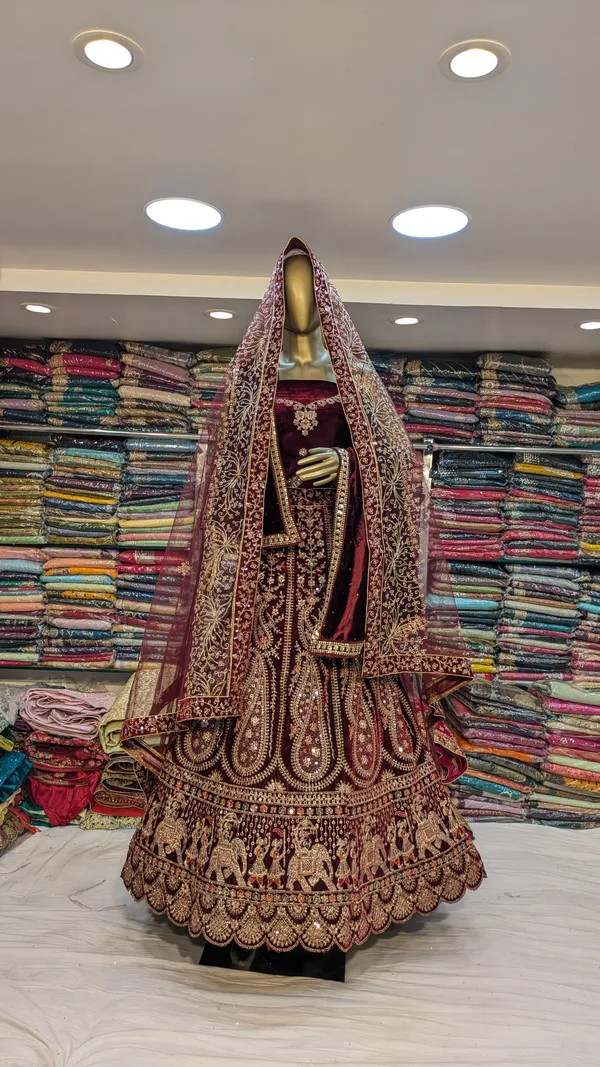 Maroon_Velvet_Bridal_Lehenga_Choli_Set_With_Zari_Work